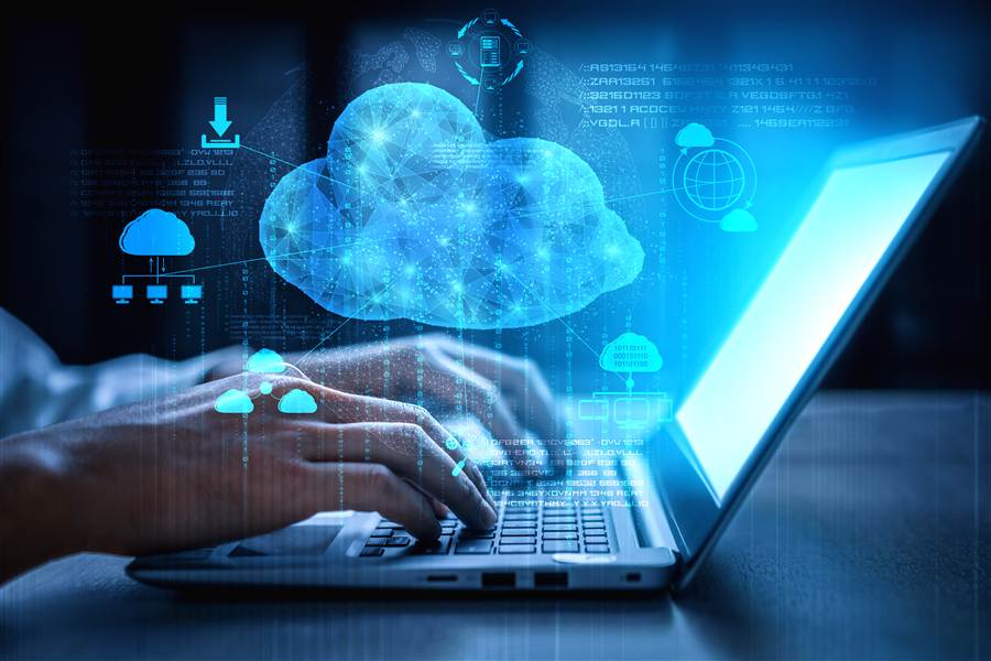 Cloud computing and data backup icons overlaid on a laptop keyboard