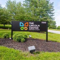Exterior sign for The Lincoln Center for Family and Youth at 1100 Adams Ave